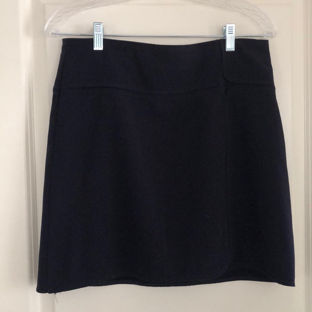 Navy skirt with side zip and detailing on front